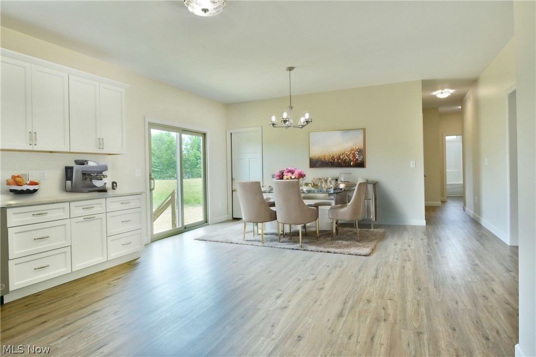 6834 Palmyra Road Southwest Warren, OH 44481 - Photo 13 of 33 Virtually Staged Dining Area