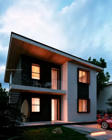 a front view of a house with yard