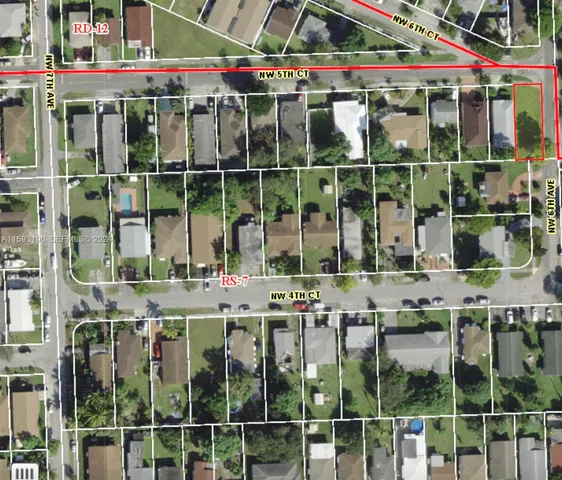 a view of a store with a chair and table