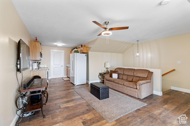 19502 South Olson Road Downey, ID 83234 - Photo 45 of 64 ADU: Living area featuring dark wood-type flooring, a ceiling fan, and lofted ceiling