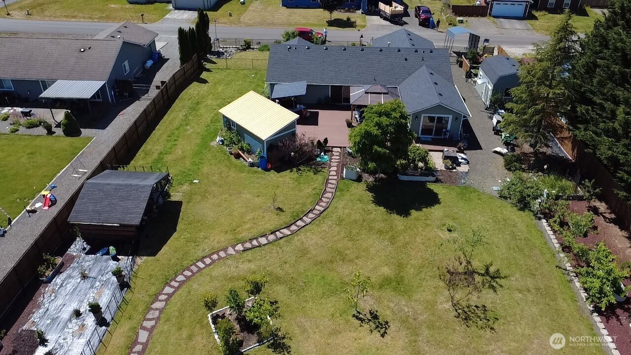 5922 184th Lane Southwest Rochester, WA 98579 - Photo 32 of 34 an aerial view of a house with a swimming pool
