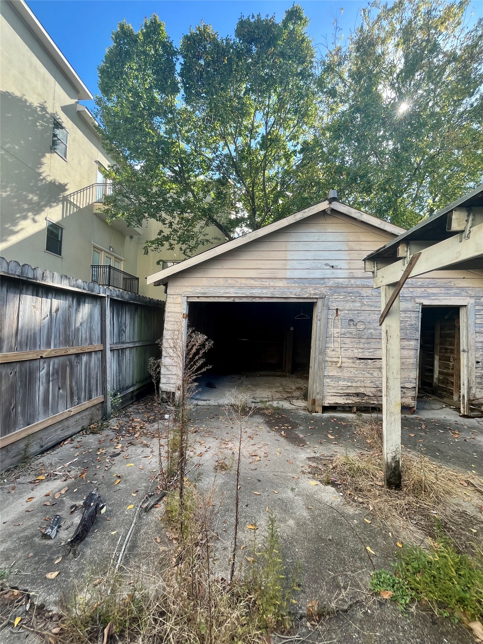 5845 Darling Street Houston, TX 77007 - Photo 26 of 27 a view of a house with a yard and garage