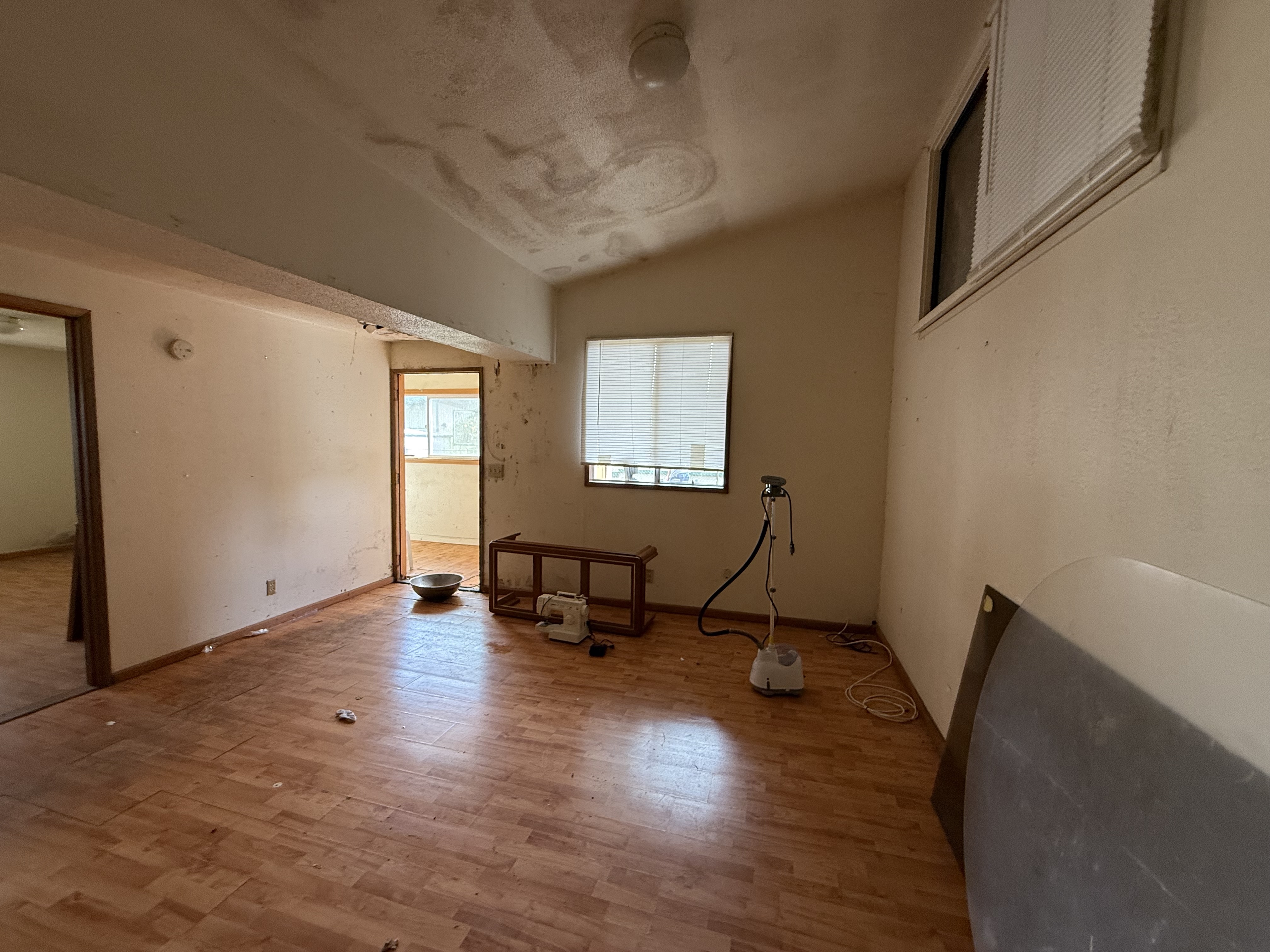64-5231 White Road Kamuela, HI 96743 - Photo 12 of 15 a work room with wooden floor and a window