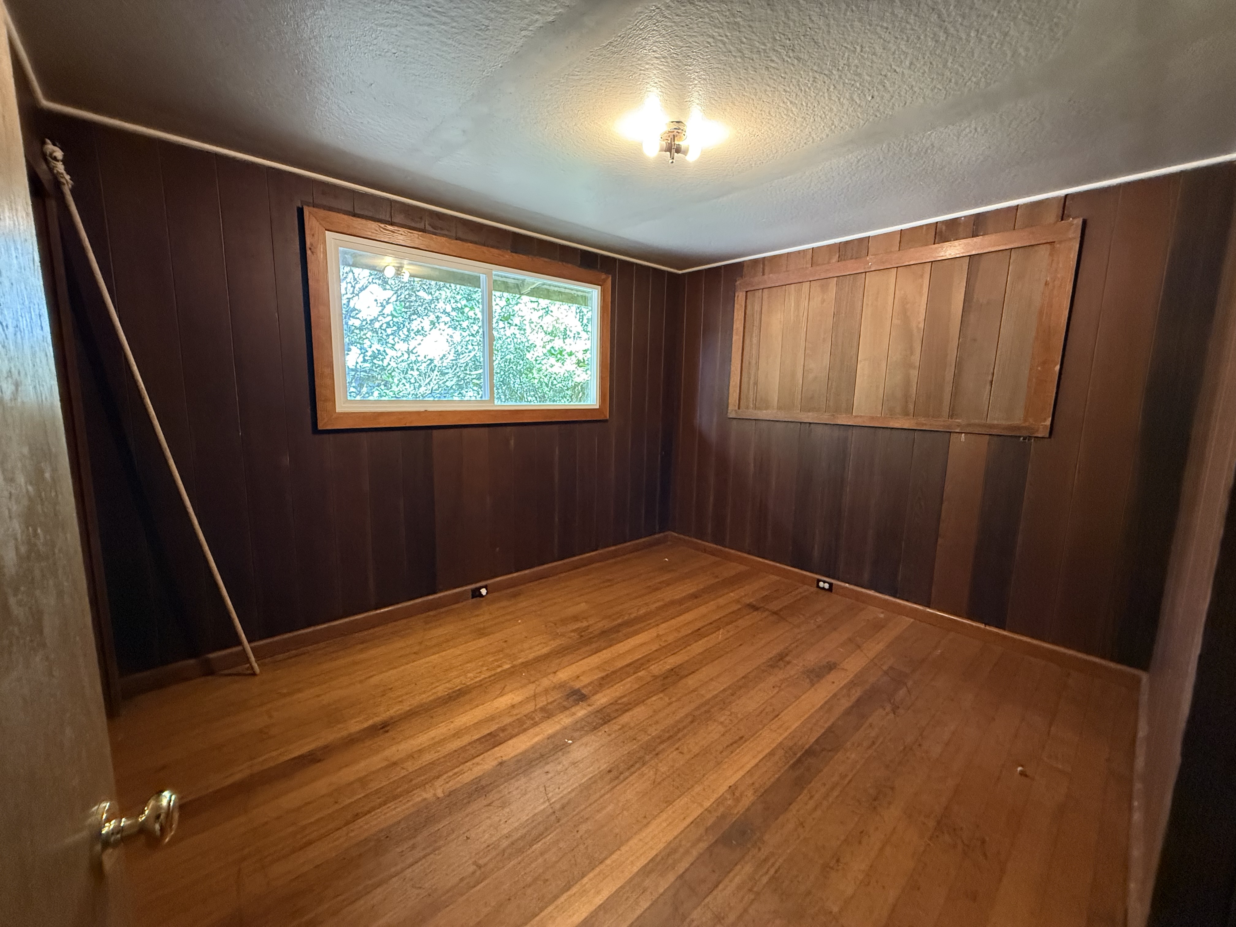 64-5231 White Road Kamuela, HI 96743 - Photo 10 of 15 a view of empty room with wooden floor and fan
