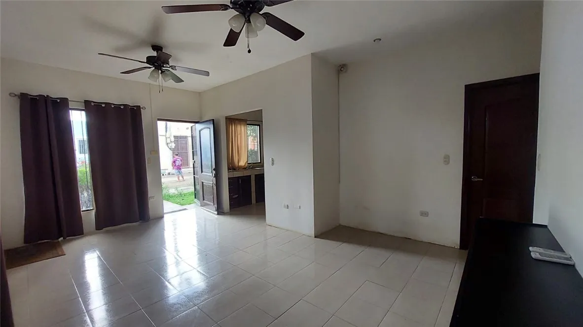 13 Masaya Highway Schenectady, OS 12345 - Photo 12 of 12 wooden floor in an empty room with a window