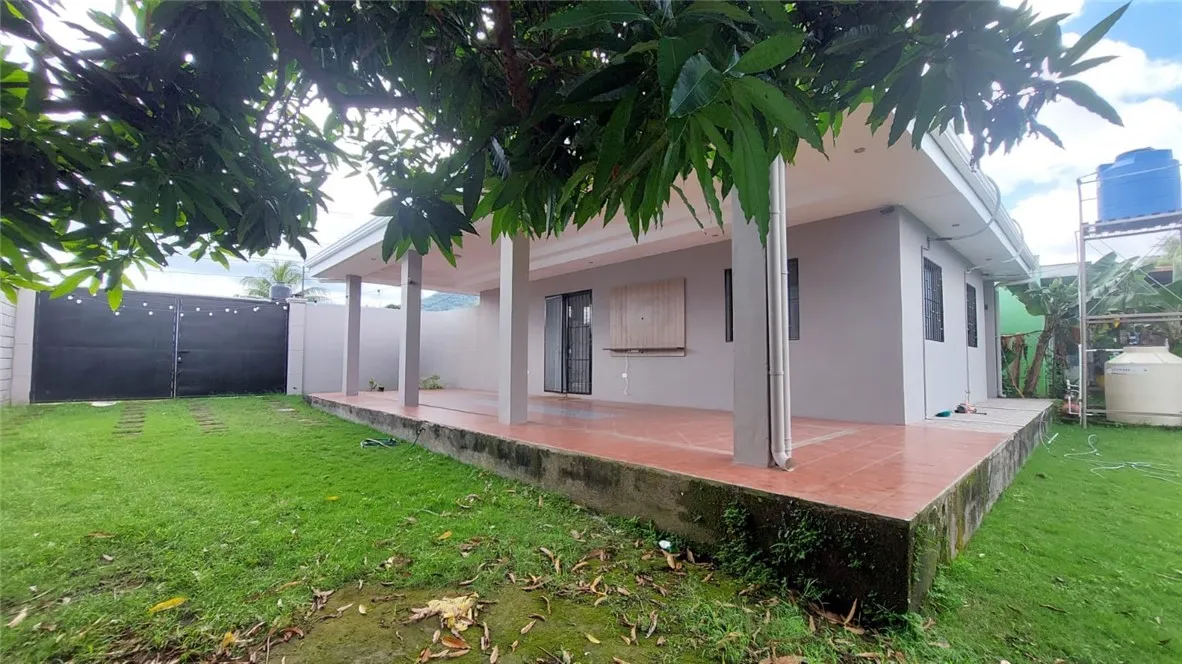 13 Masaya Highway Schenectady, OS 12345 - Photo 3 of 12 a front view of a house with garden