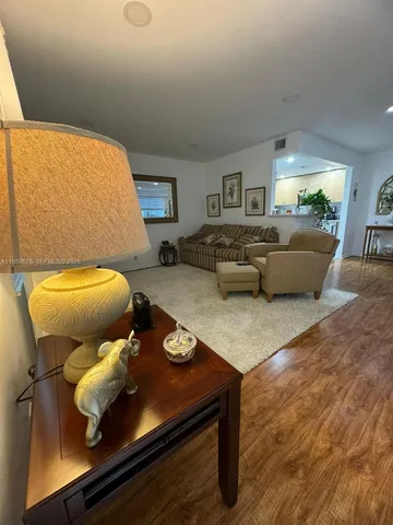 a living room with furniture and a couch