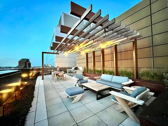 a outdoor space with lots of tables and chairs