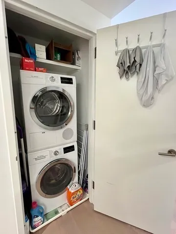 a utility room with dryer and washer