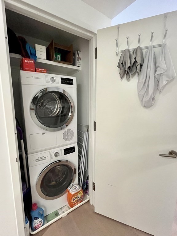 100 Lovejoy Wharf, Unit 8M Boston, MA 02114 - Photo 22 of 37 a utility room with dryer and washer