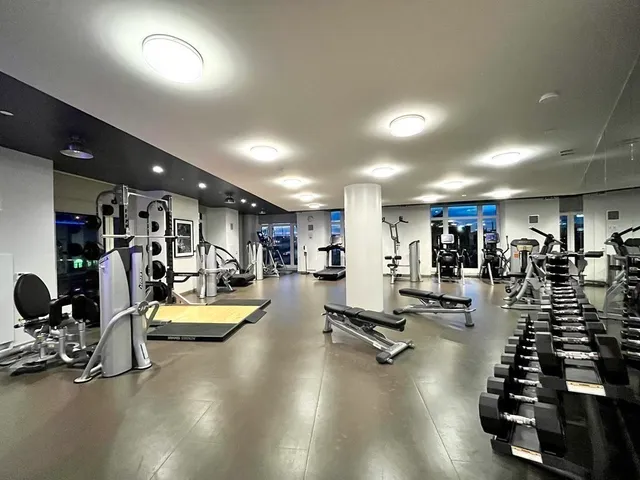 a view of a room with gym equipment