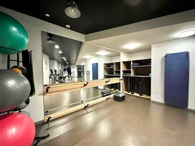 a view of a room with gym equipment