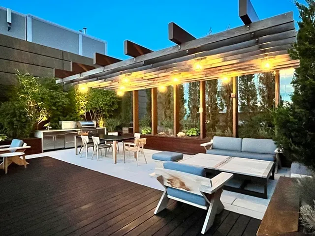 a outdoor space with lots of trees in the background