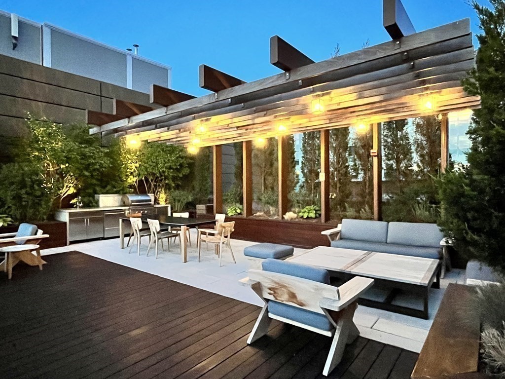 100 Lovejoy Wharf, Unit 8M Boston, MA 02114 - Photo 35 of 37 a view of a patio with swimming pool