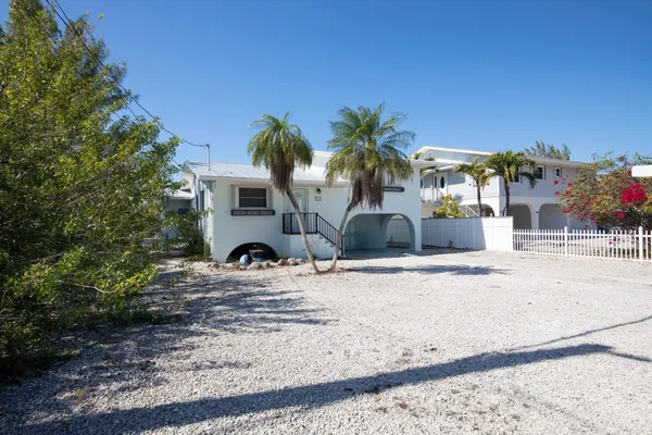 a view of a house with a snow