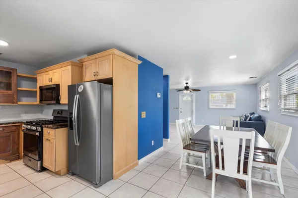 a view of a balcony with wooden floor
