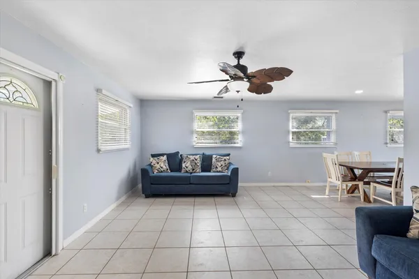 a living room with furniture and a window