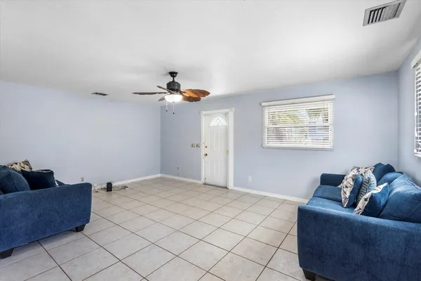 a view of a balcony with wooden floor