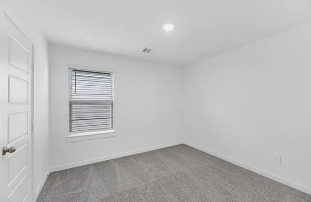a bathroom with 2 sink tub and a mirror