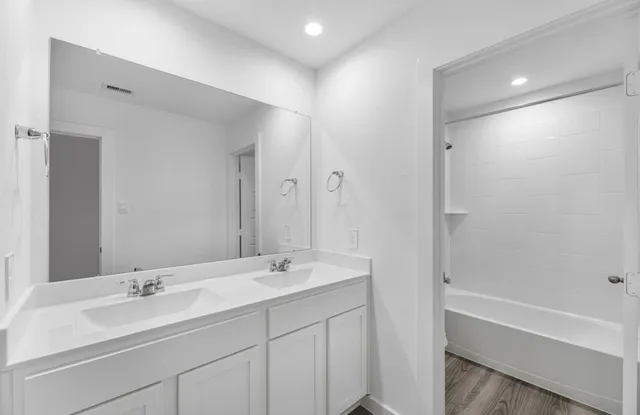 a bathroom with a bathtub