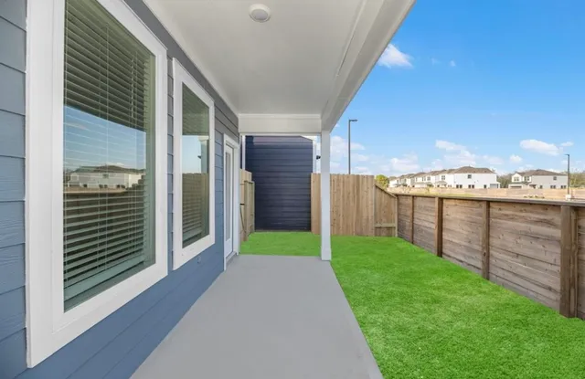 a front view of a house with garage