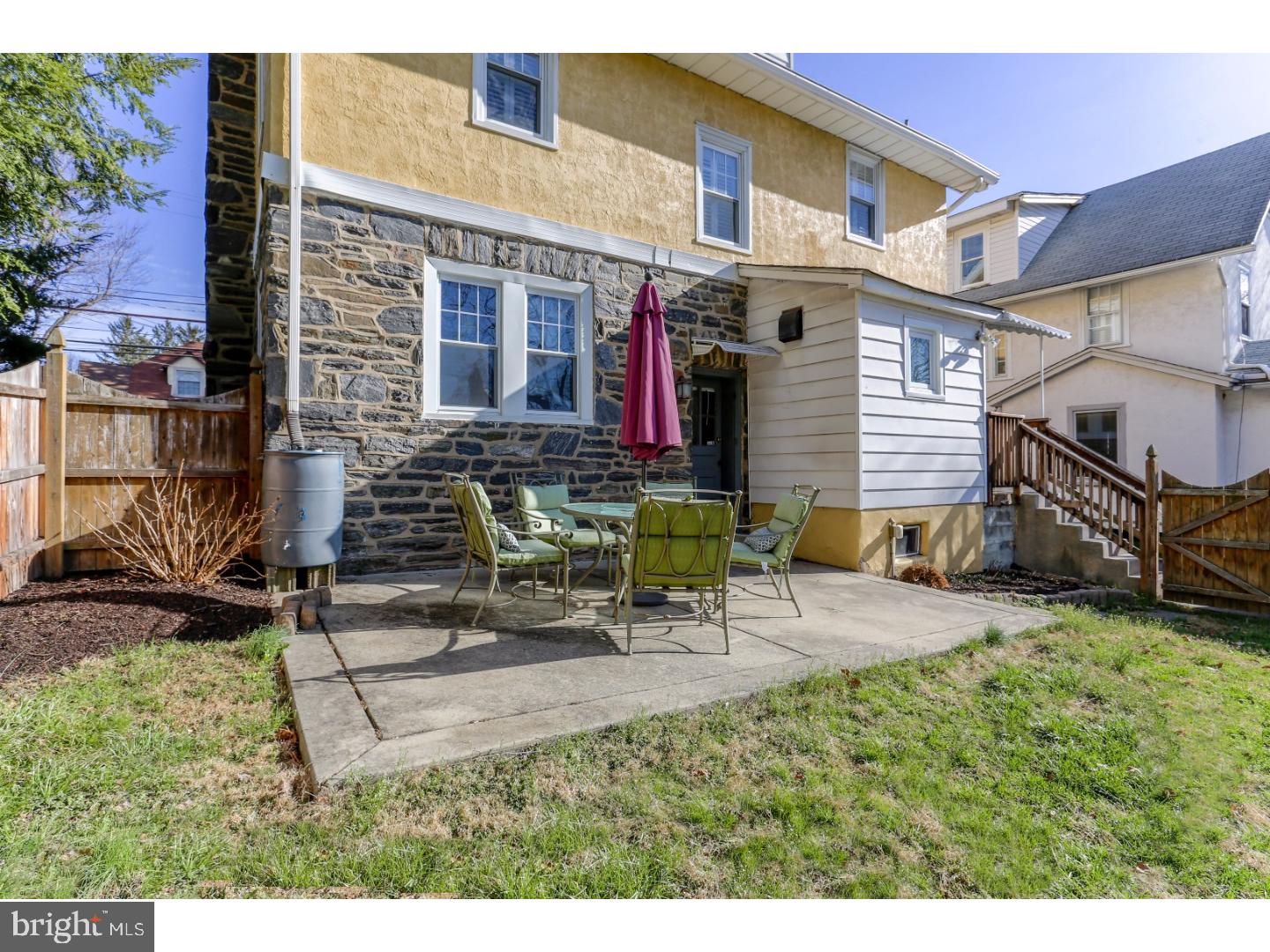 519 East Manoa Road Havertown, PA 19083 - Photo 18 of 20 a view of a house with backyard porch and sitting area