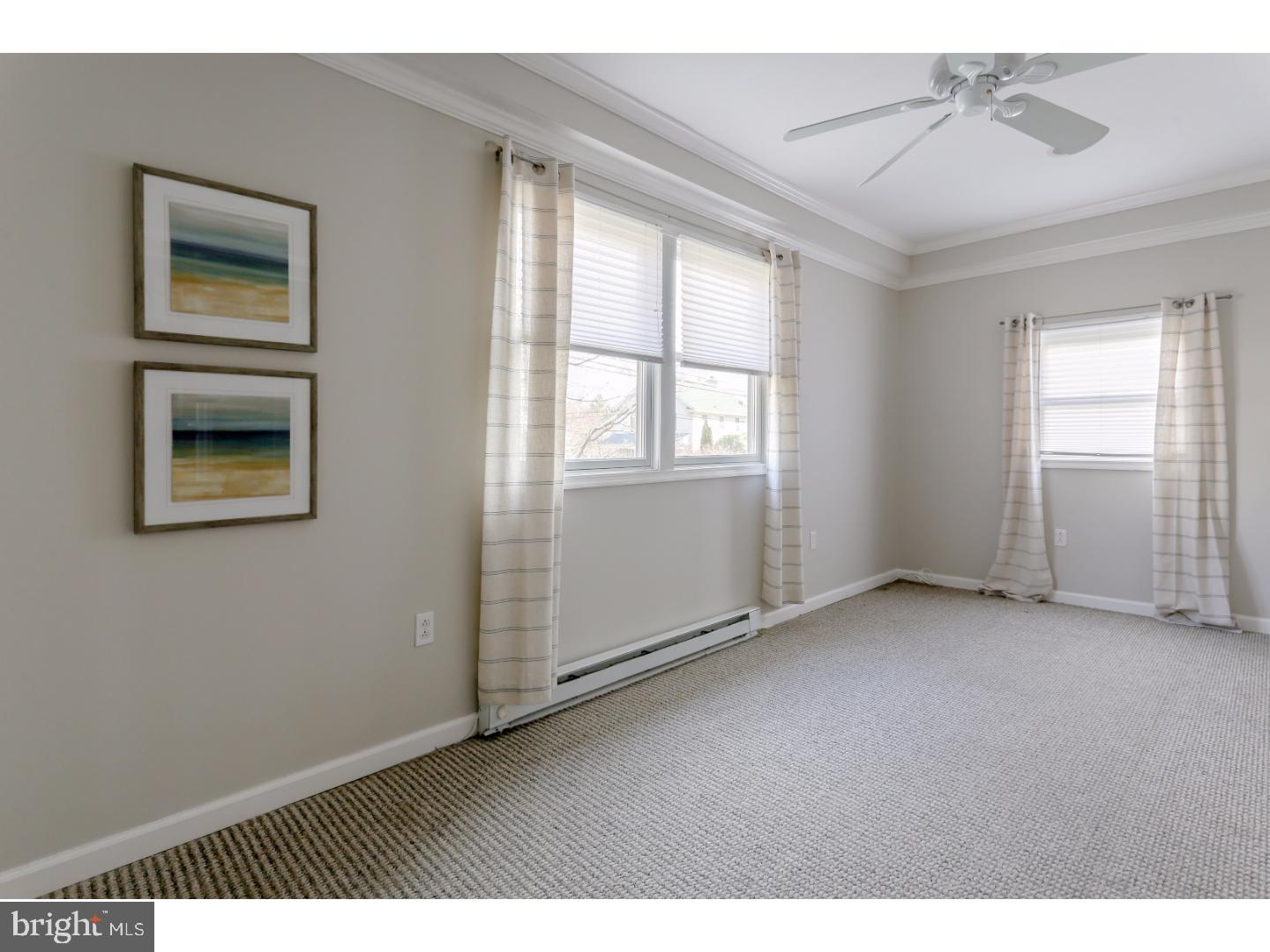 519 East Manoa Road Havertown, PA 19083 - Photo 3 of 20 an empty room with windows and closet