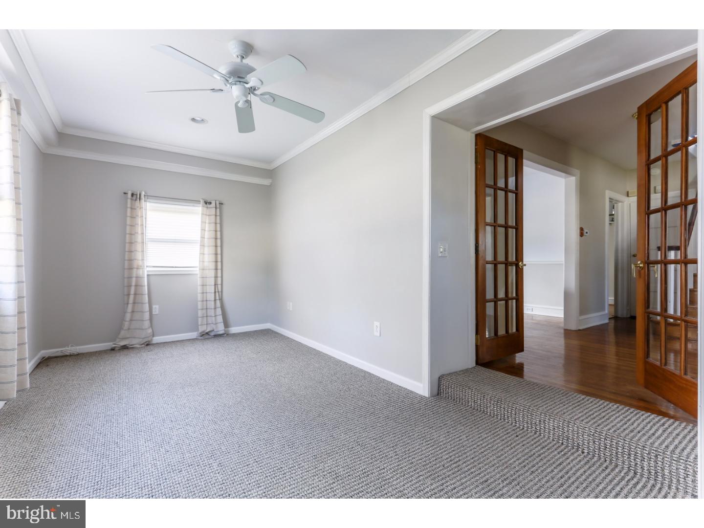 519 East Manoa Road Havertown, PA 19083 - Photo 4 of 20 a view of an empty room with a window