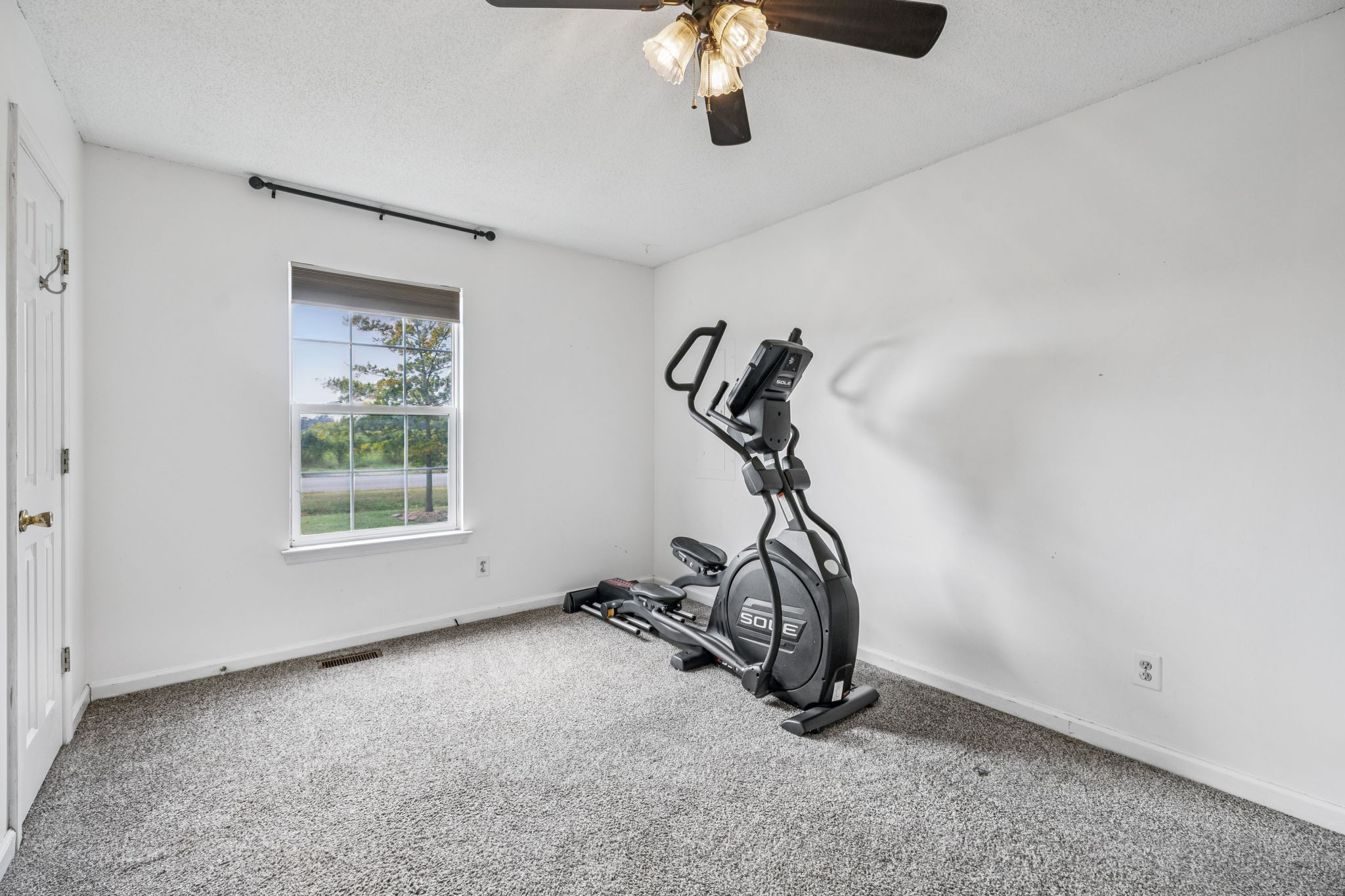 1547 Longview Road Unionville, TN 37180 - Photo 21 of 41 a view of a room with gym equipment