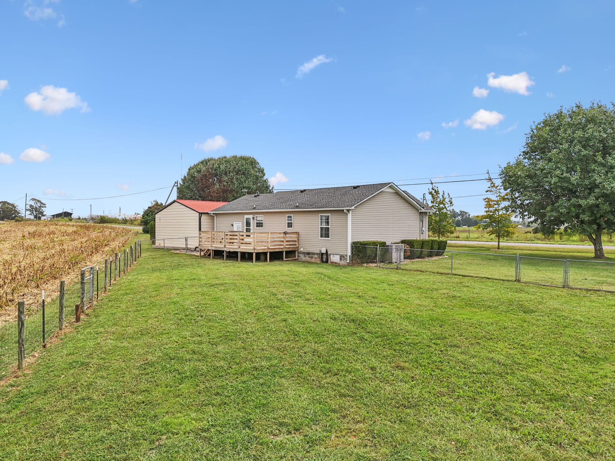 1547 Longview Road Unionville, TN 37180 - Photo 28 of 41 a view of a house with a yard and sitting area