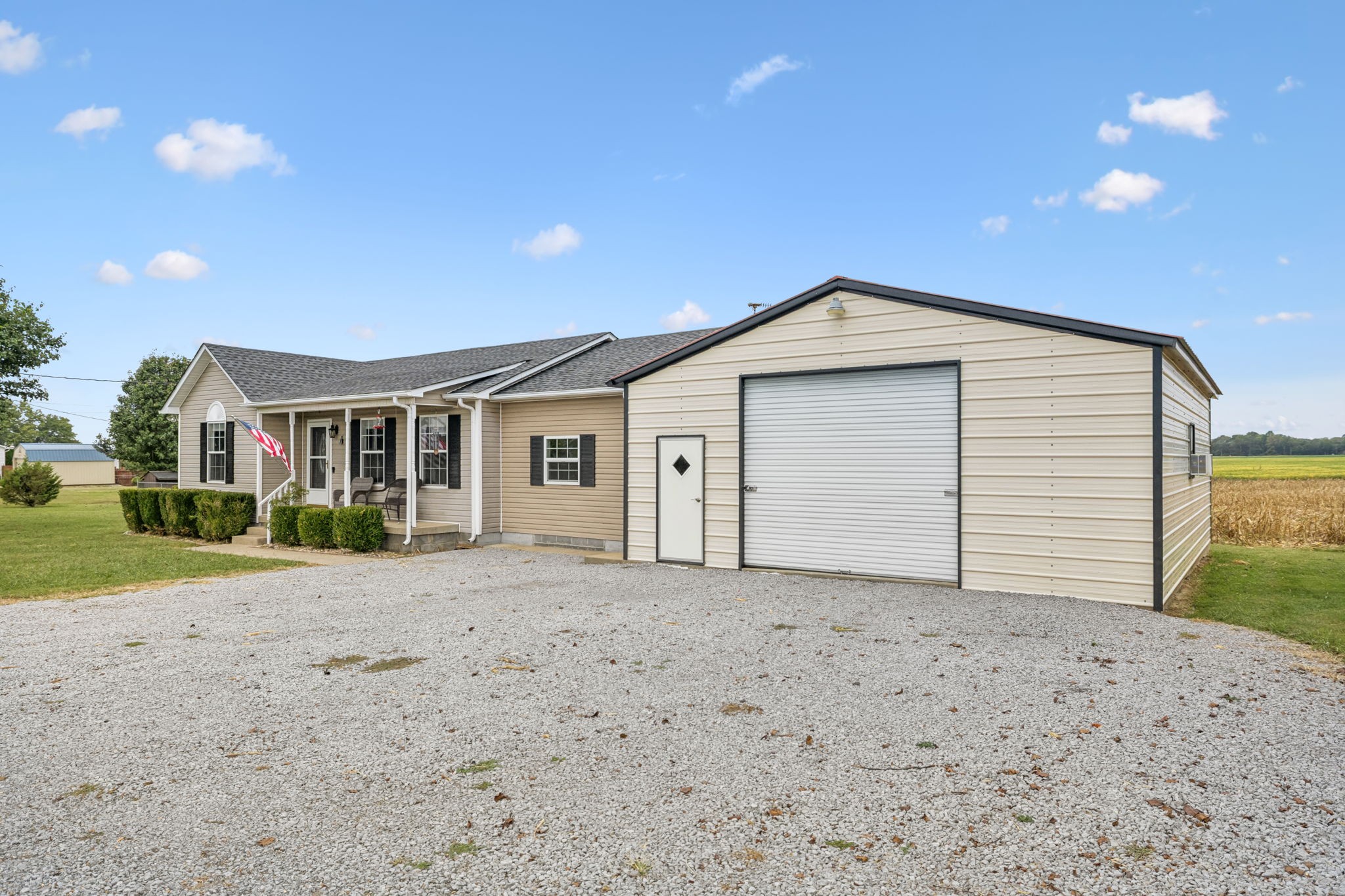 1547 Longview Road Unionville, TN 37180 - Photo 31 of 41 a front view of a house with a yard and garage