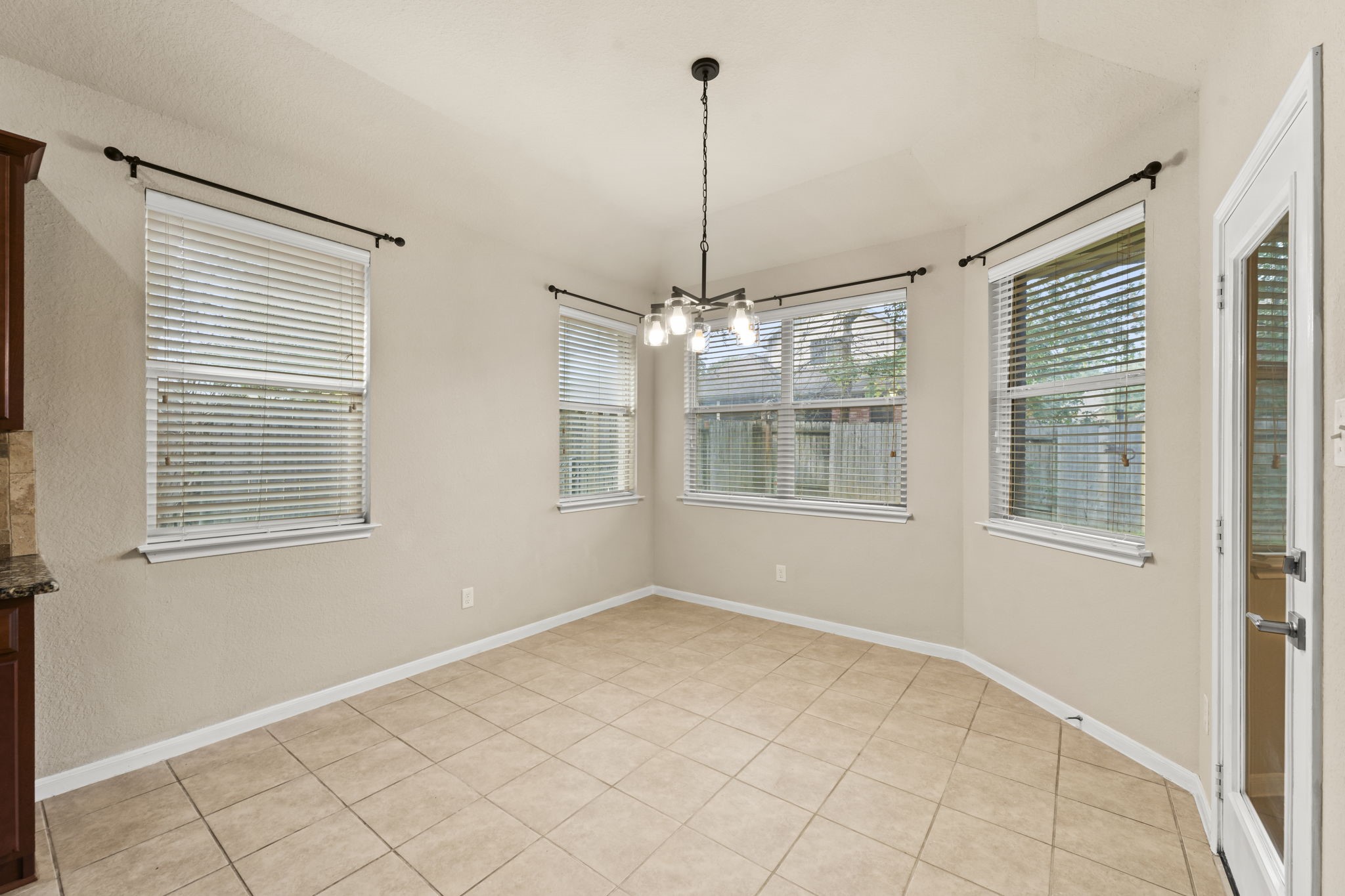 1906 Pagemill Lane Conroe, TX 77304 - Photo 17 of 41 a view of an empty room with a window
