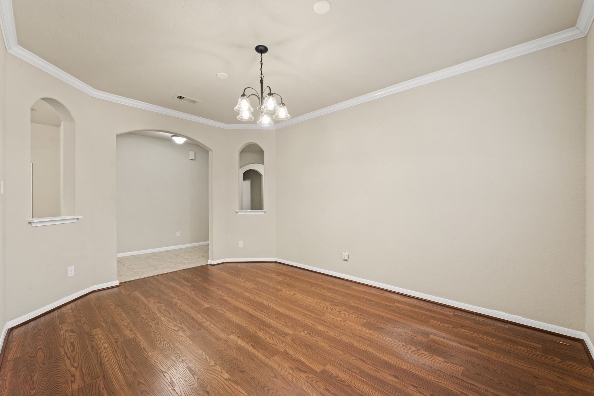 1906 Pagemill Lane Conroe, TX 77304 - Photo 29 of 41 a view of empty room with wooden floor