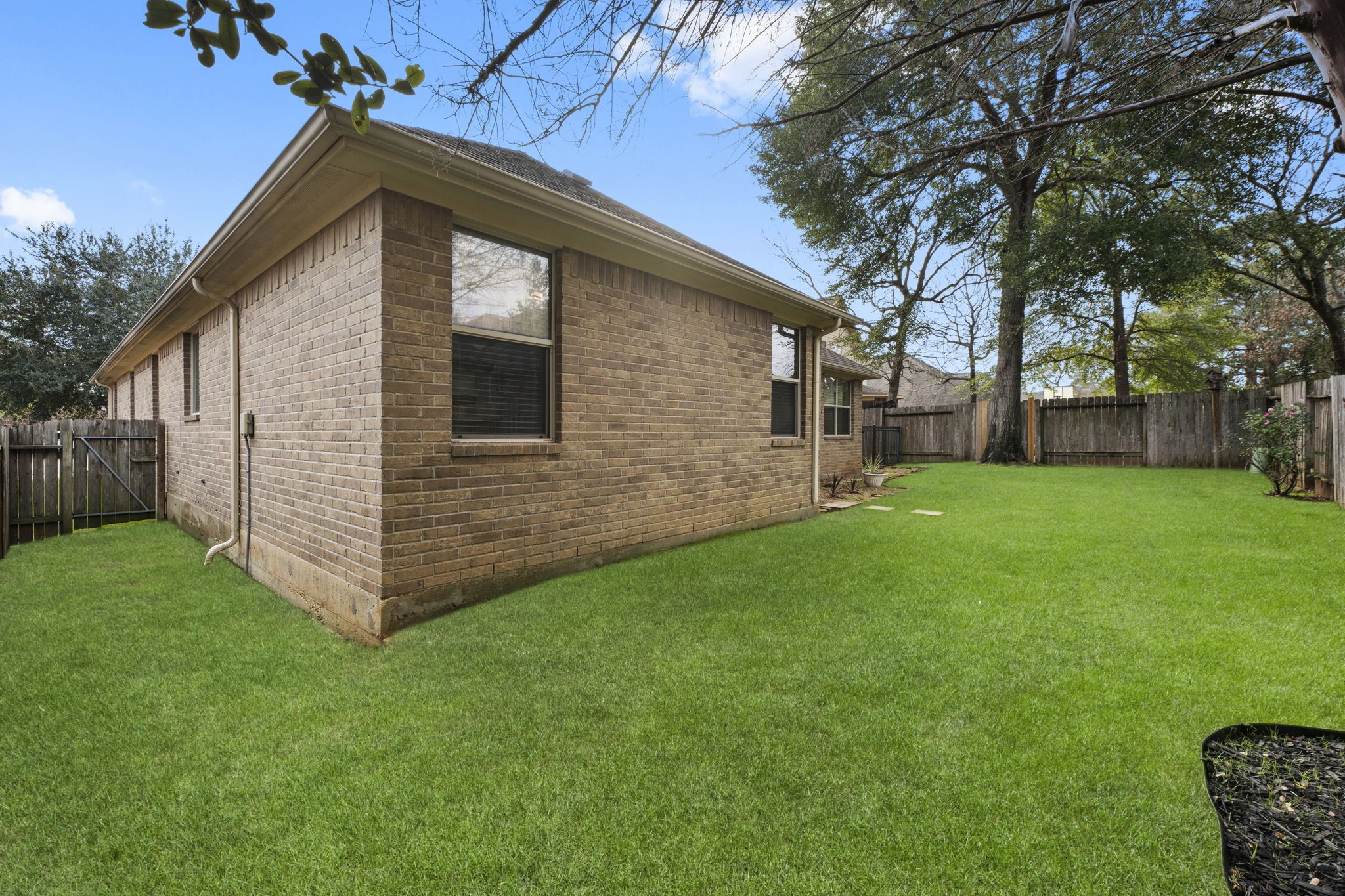1906 Pagemill Lane Conroe, TX 77304 - Photo 38 of 41 a front view of house with yard and green space