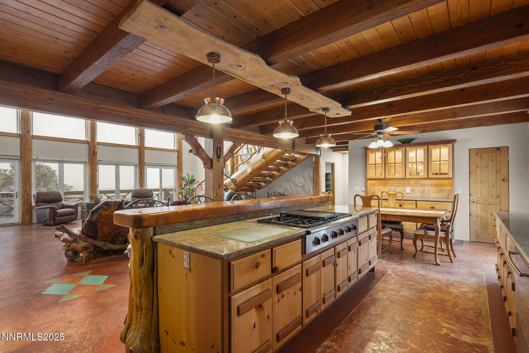 1610 Combination Road Reno, NV 89521 - Photo 14 of 64 a kitchen with a stove and a table