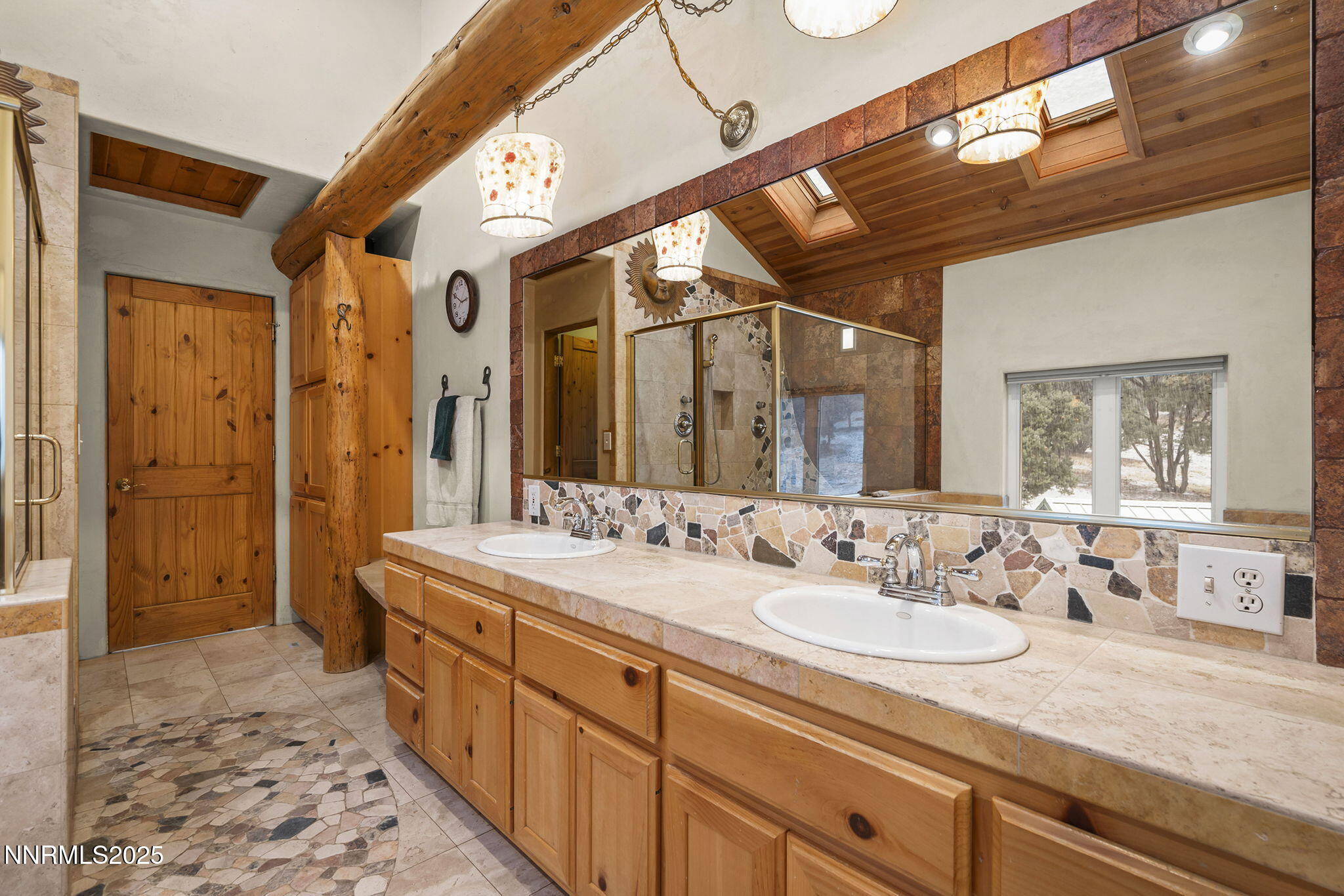 1610 Combination Road Reno, NV 89521 - Photo 28 of 64 a spacious bathroom with a sink double vanity granite tub shower and a mirror