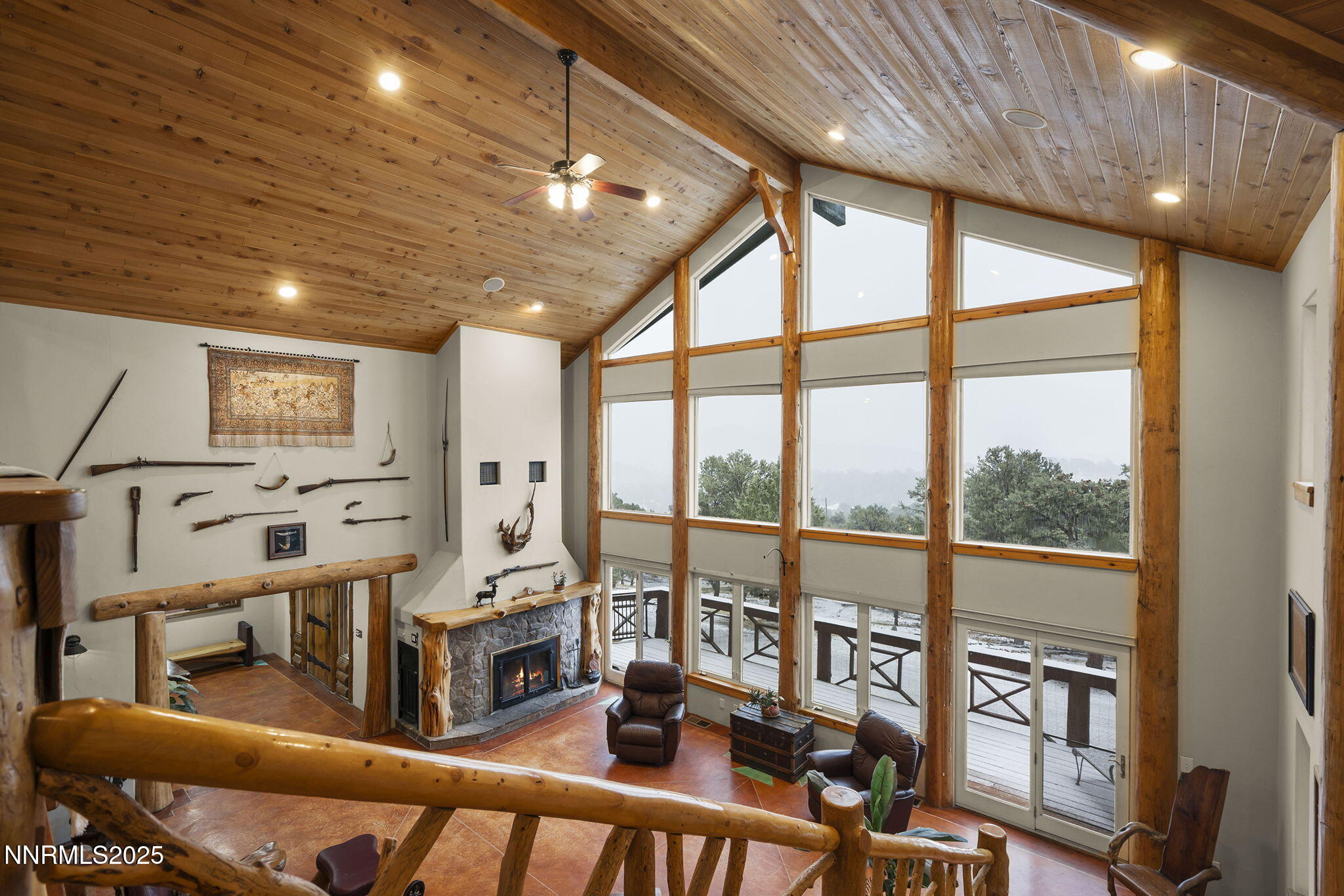 1610 Combination Road Reno, NV 89521 - Photo 34 of 64 a living room with furniture a flat screen tv and a large window