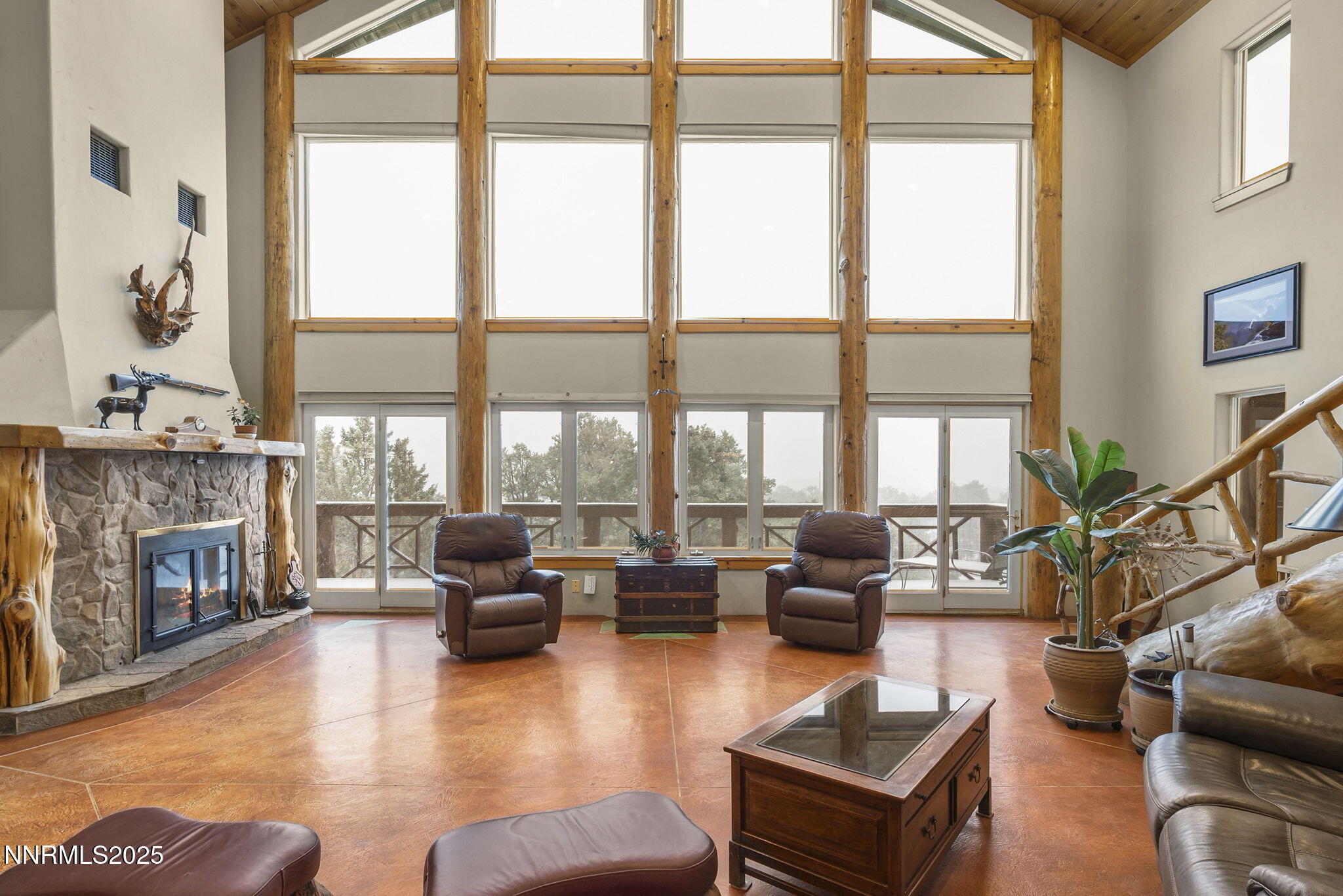 1610 Combination Road Reno, NV 89521 - Photo 8 of 64 a living room with fireplace furniture and a large window