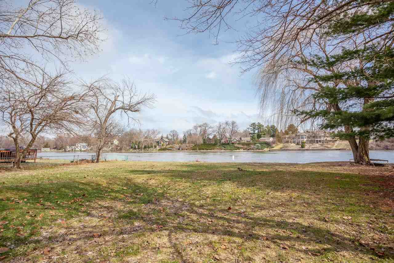 5065 Browns Beach Road Rockford, IL 61103 - Photo 6 of 9 a view of an ocean with trees