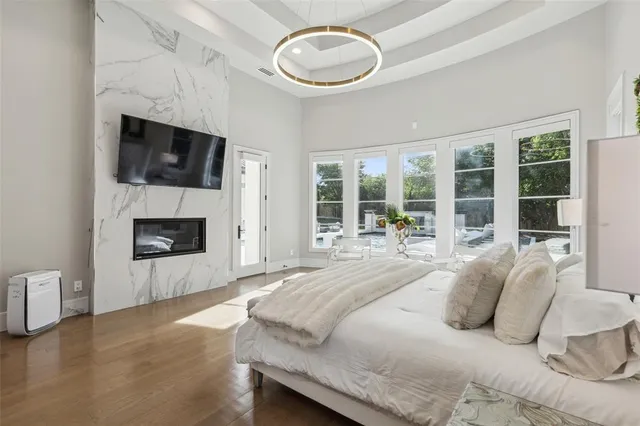 a bed room with a bed and a fireplace