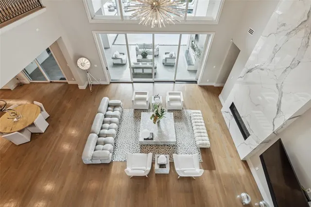 a view of living room with furniture and floor to ceiling window