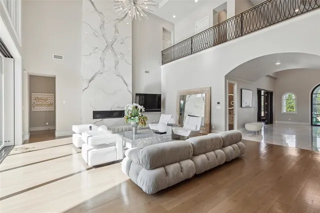 a living room with furniture and white walls