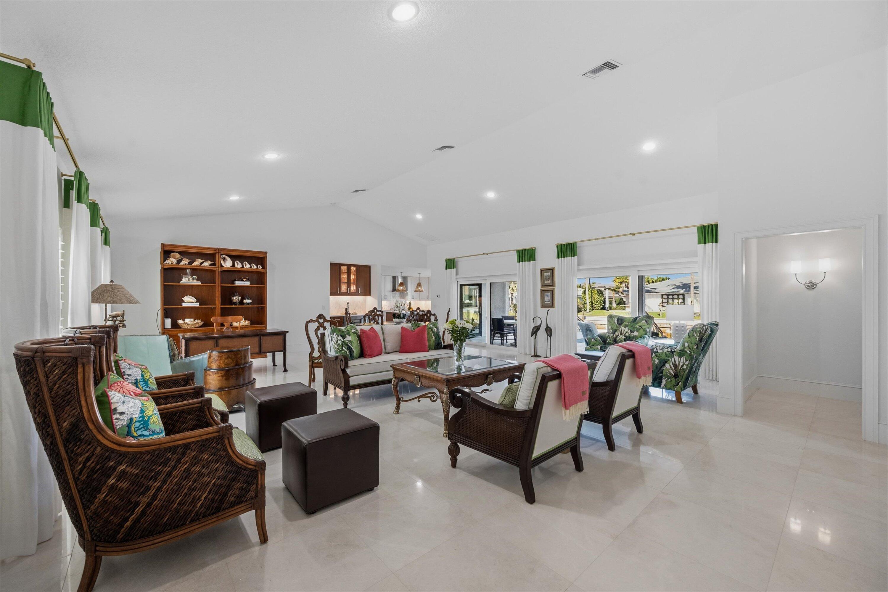 9039 Southeast Hawksbill Way Hobe Sound, FL 33455 - Photo 11 of 45 a living room with furniture and a wooden floor