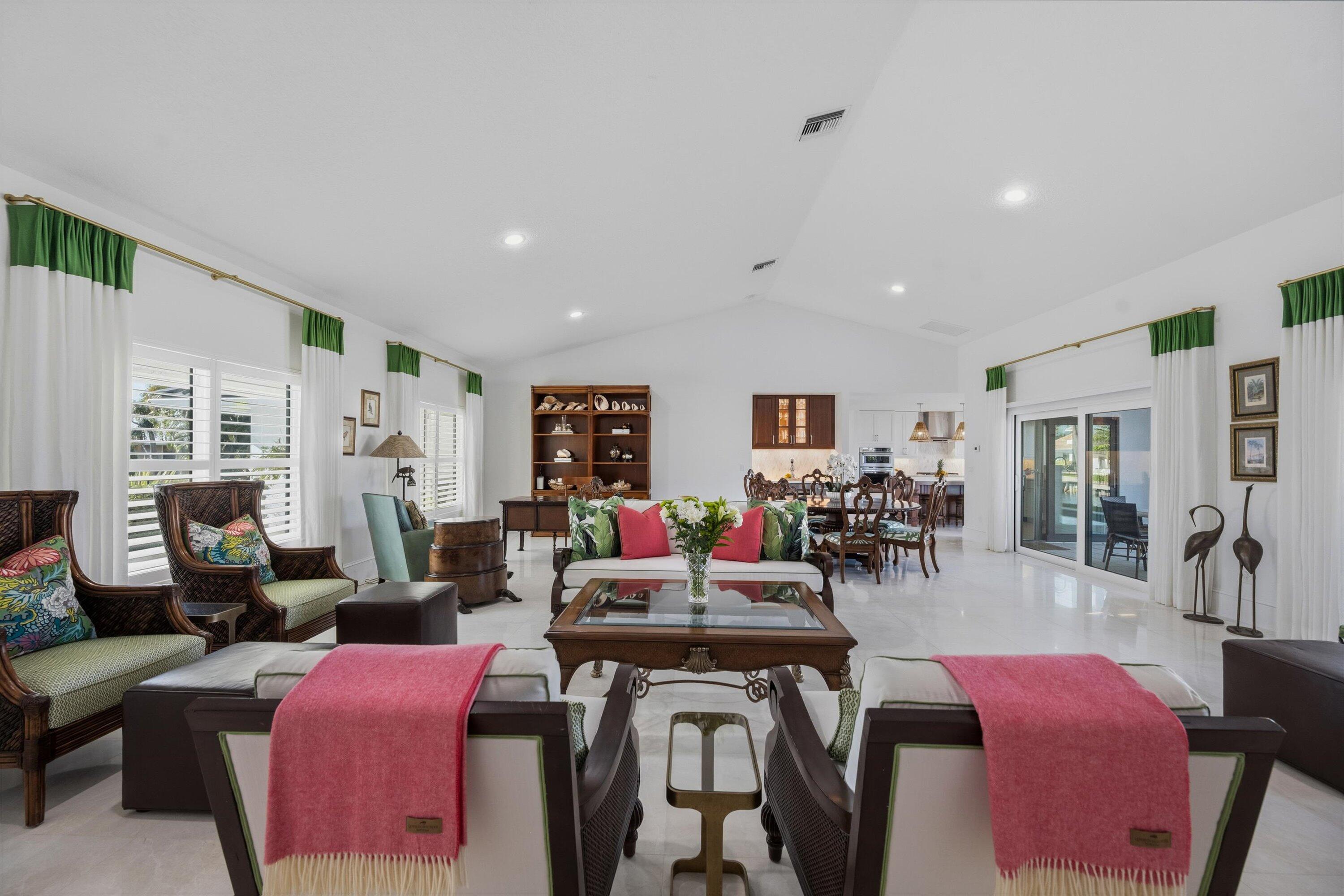 9039 Southeast Hawksbill Way Hobe Sound, FL 33455 - Photo 12 of 45 a living room with furniture and wooden floor