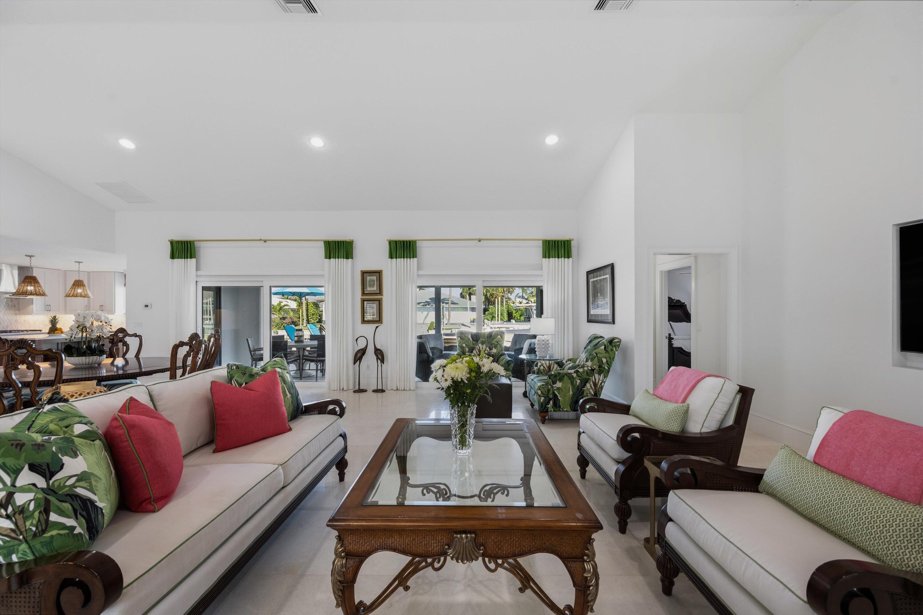9039 Southeast Hawksbill Way Hobe Sound, FL 33455 - Photo 13 of 45 a living room with furniture or couch and a living room