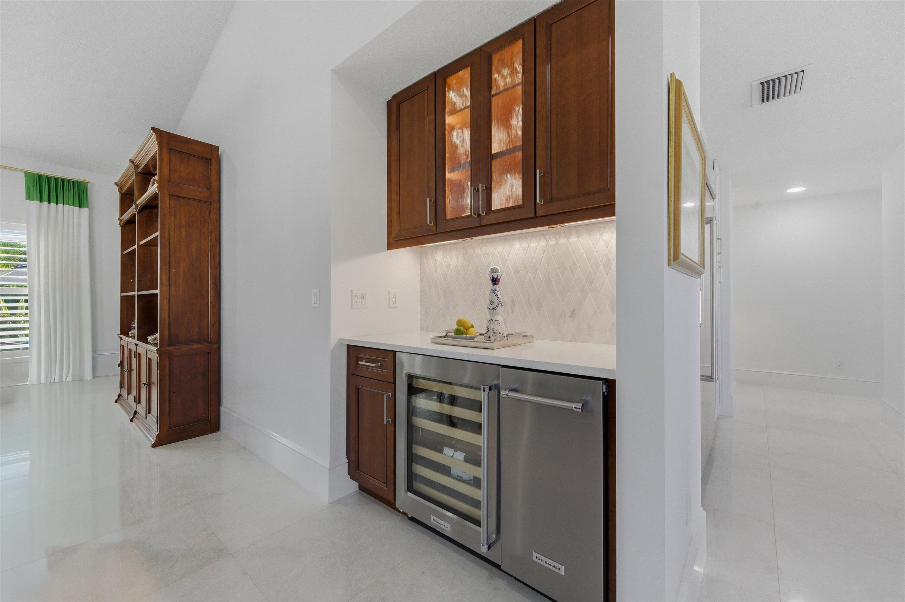 9039 Southeast Hawksbill Way Hobe Sound, FL 33455 - Photo 16 of 45 a bathroom with a sink and a mirror