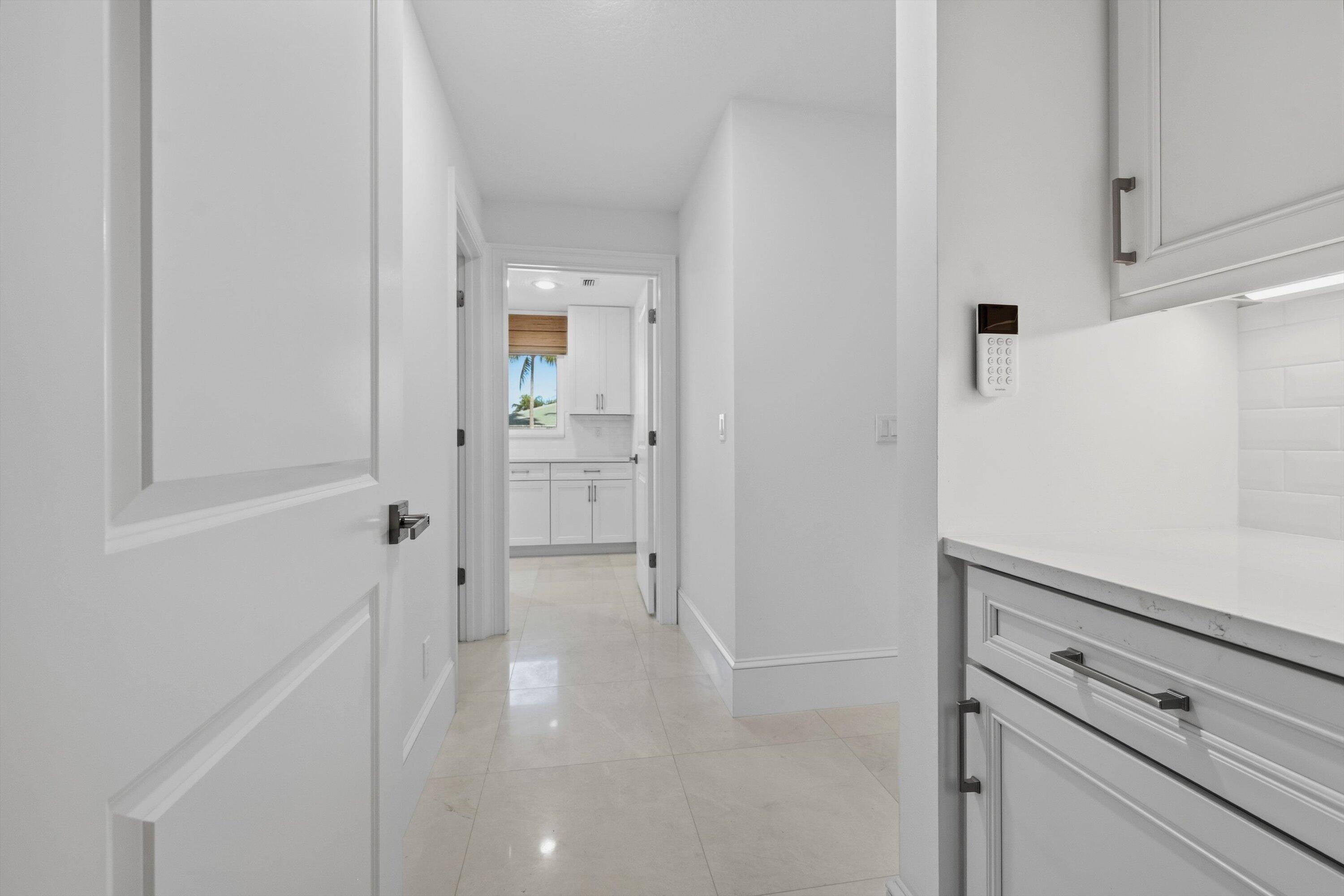 9039 Southeast Hawksbill Way Hobe Sound, FL 33455 - Photo 29 of 45 a view of cabinets