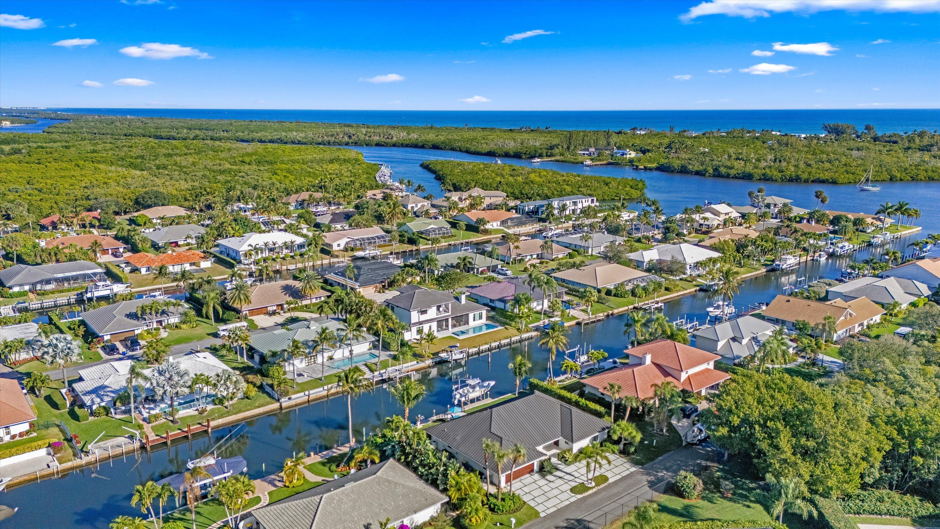 9039 Southeast Hawksbill Way Hobe Sound, FL 33455 - Photo 42 of 45 an aerial view of a city