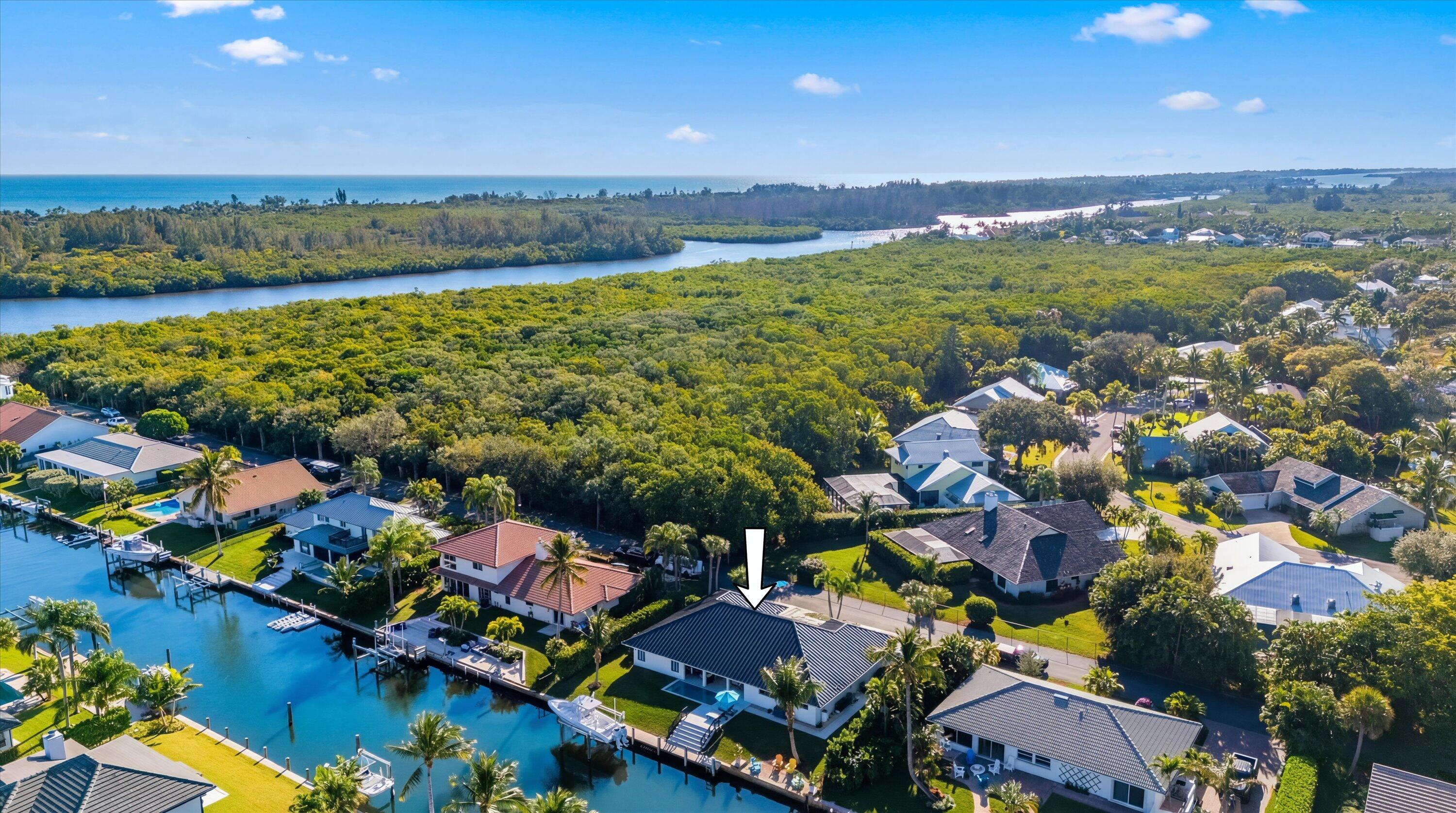 9039 Southeast Hawksbill Way Hobe Sound, FL 33455 - Photo 44 of 45 a view of lake and mountain