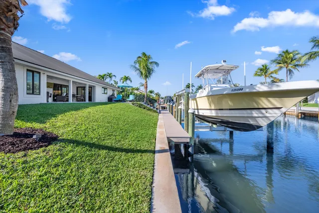 a view of an chairs and table in the patio